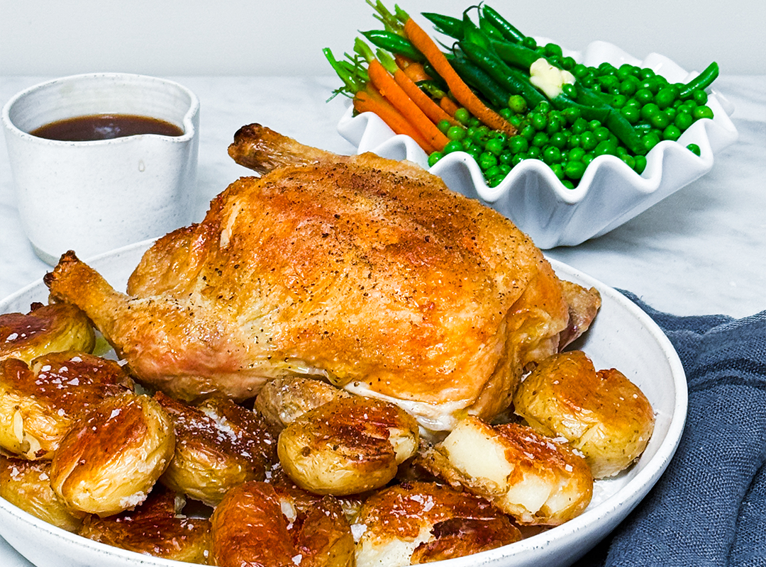 Lucy Tweed Roast Chicken with Side Dish Image